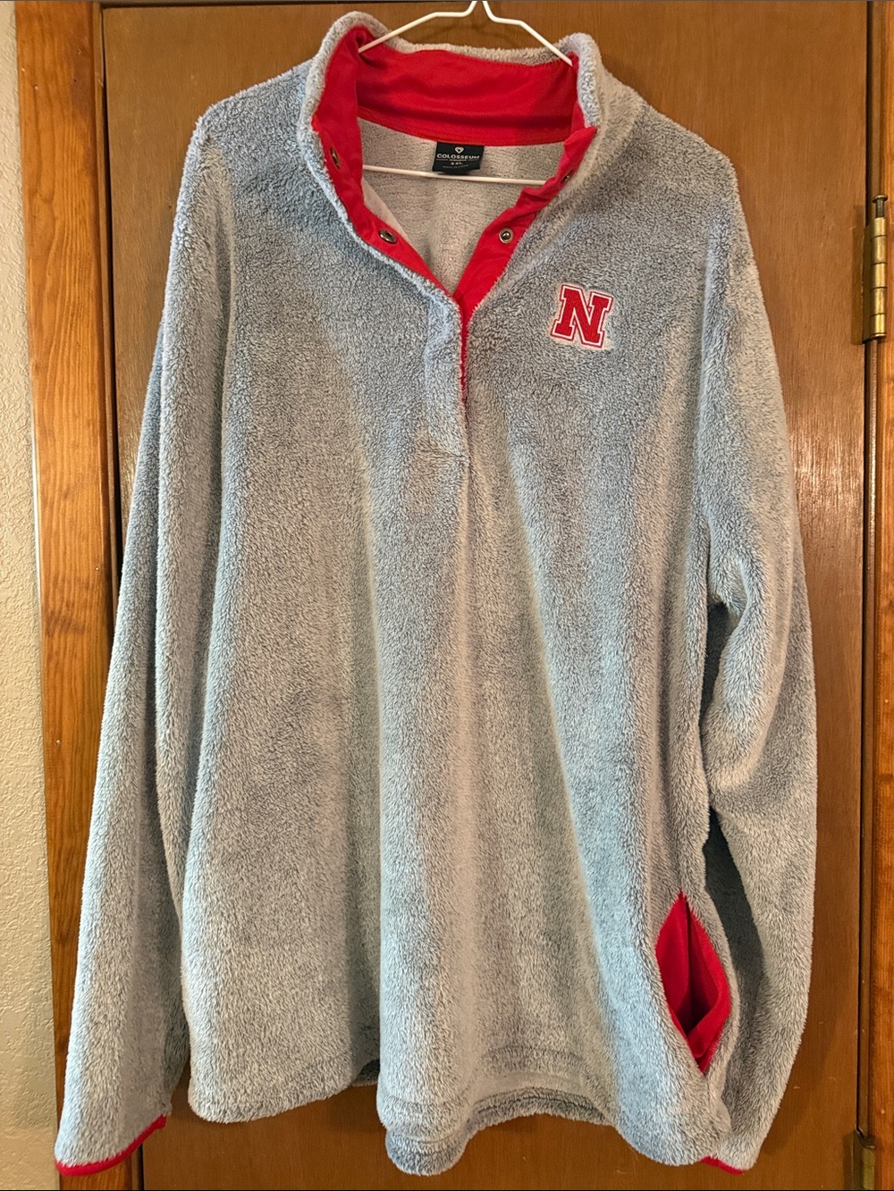 Colosseum Woman’s Gray Nebraska Fleece Button Snaps with Red Accents